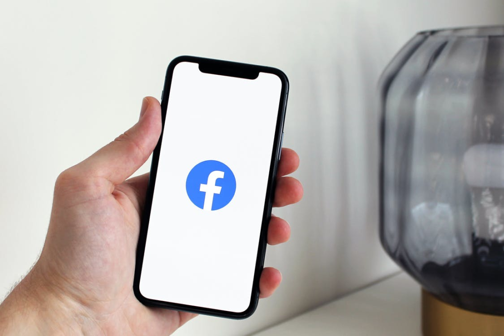 smartphone displaying Facebook logo